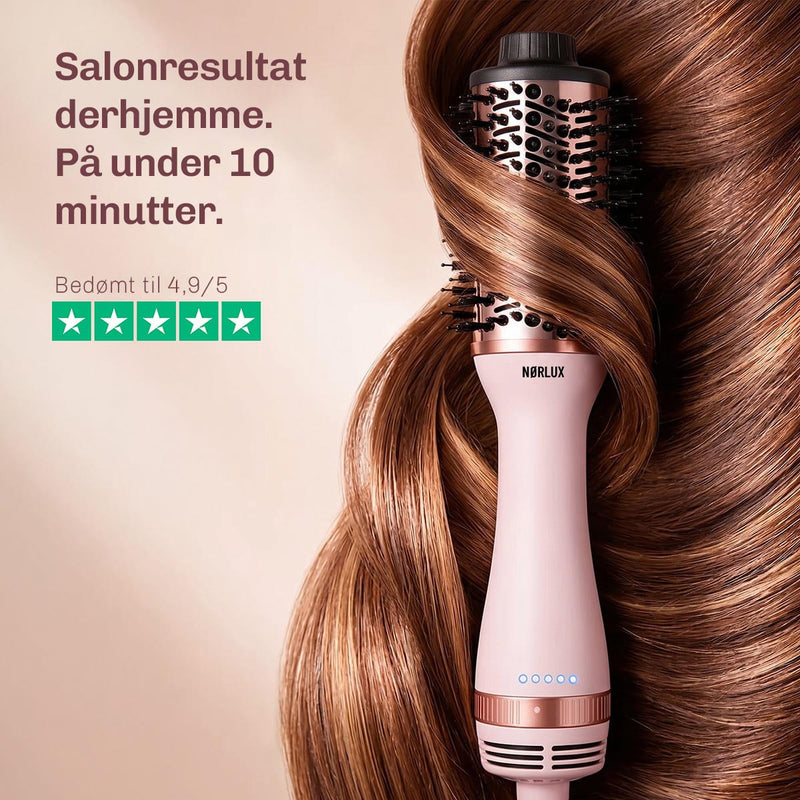 Oval titanbørste med jævn varmefordeling for skånsom styling og glansfuldt hår.